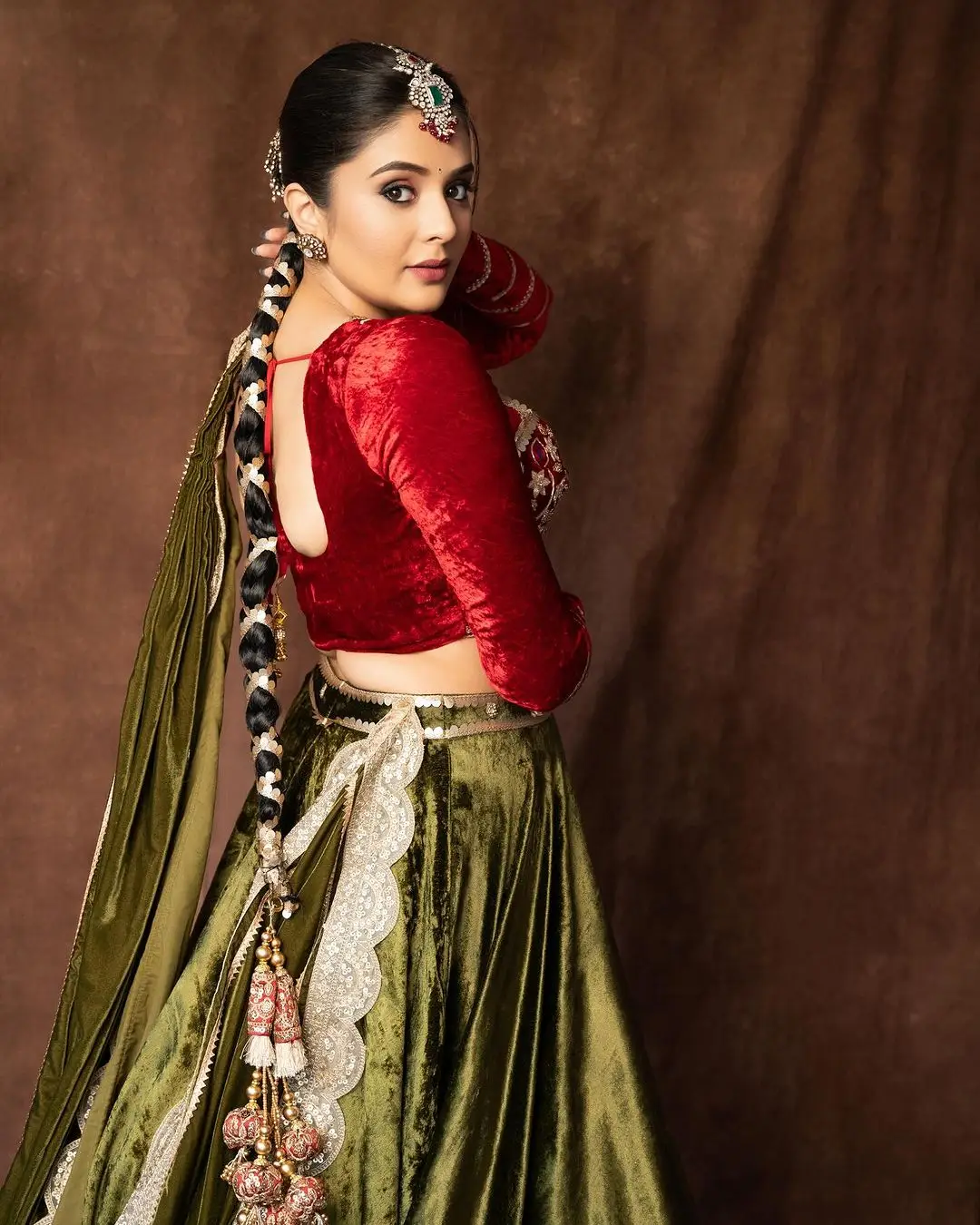 Indian TV Actress Sreemukhi in Traditional Green Lehenga Red Choli